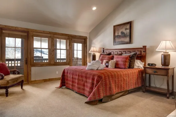 a bed room with a bed and a couch