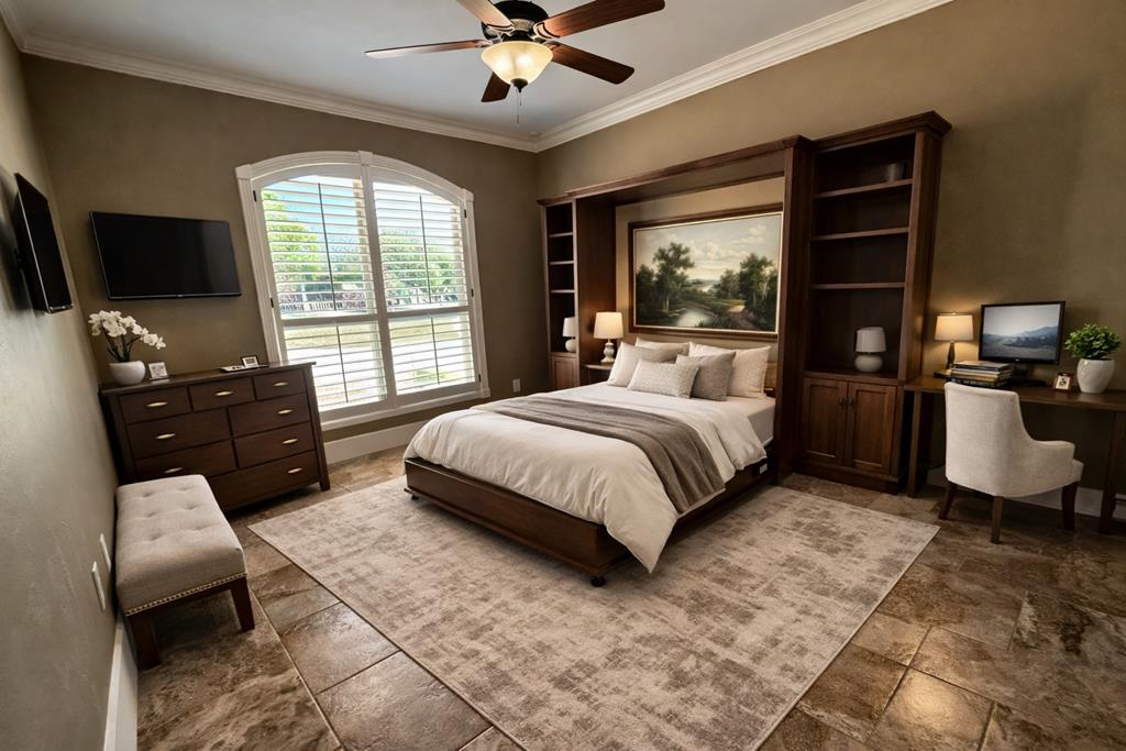 150 St Andrews Loop Kerrville, TX 78028 - Photo 12 of 27 a bedroom with a bed and glass window