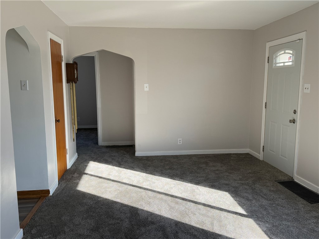 955 North McClellan Street Decatur, IL 62522 - Photo 5 of 17 a view of an empty room with closet and a window