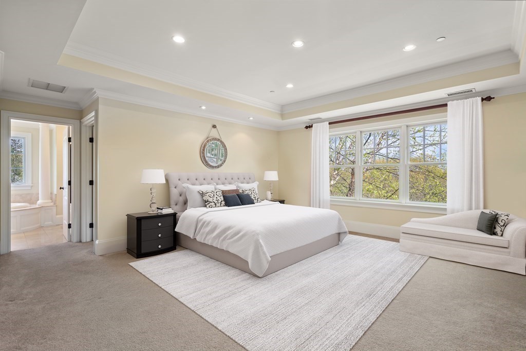 74 Carter Drive Framingham, MA 01701 - Photo 16 of 23 a bedroom with a large bed and a large window