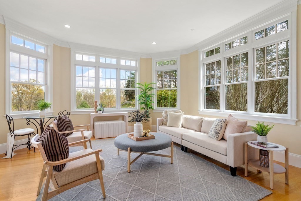 74 Carter Drive Framingham, MA 01701 - Photo 7 of 23 a living room with furniture and a large window