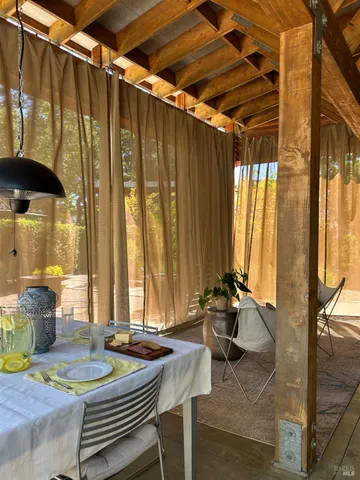 a living room with furniture and a patio