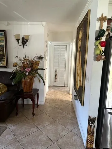 a living room with furniture and a windows