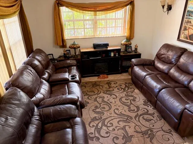 a kitchen with wooden cabinets and a stove top oven