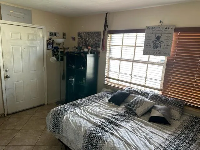 a view of a chairs and tables in the patio