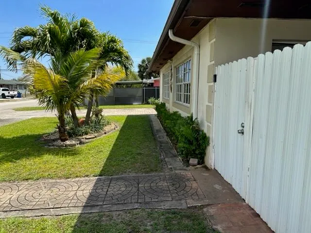 a view of a house with garden