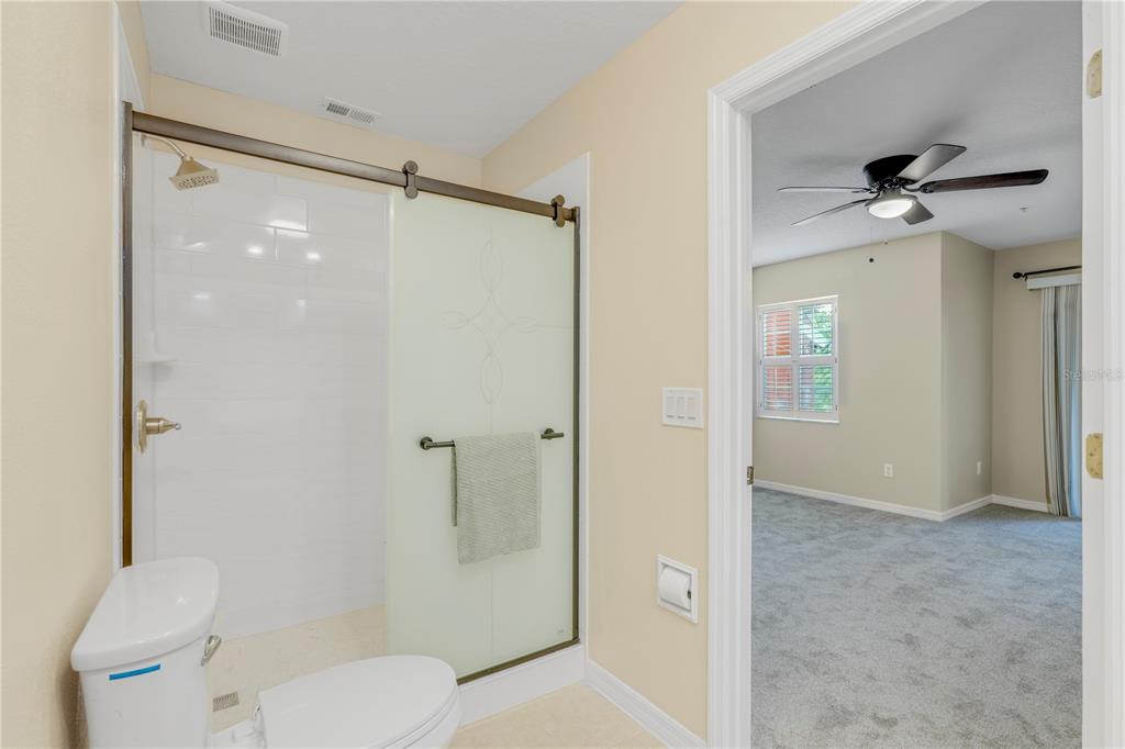 839 Assembly Court Reunion, FL 34747 - Photo 18 of 31 a bathroom that has a toilet shower and a sink