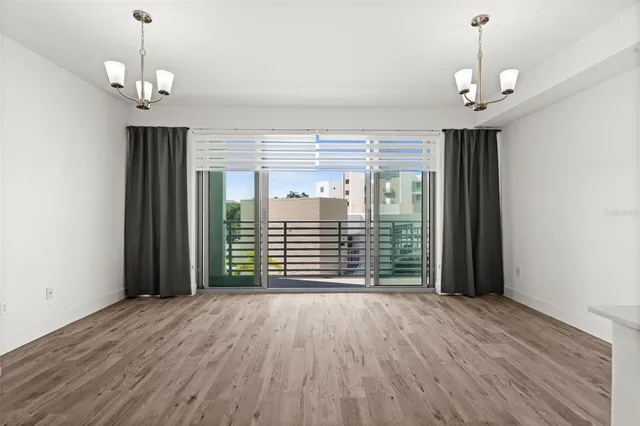 a bathroom with a sink a toilet and a large mirror