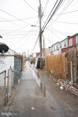 a view of a street with cars