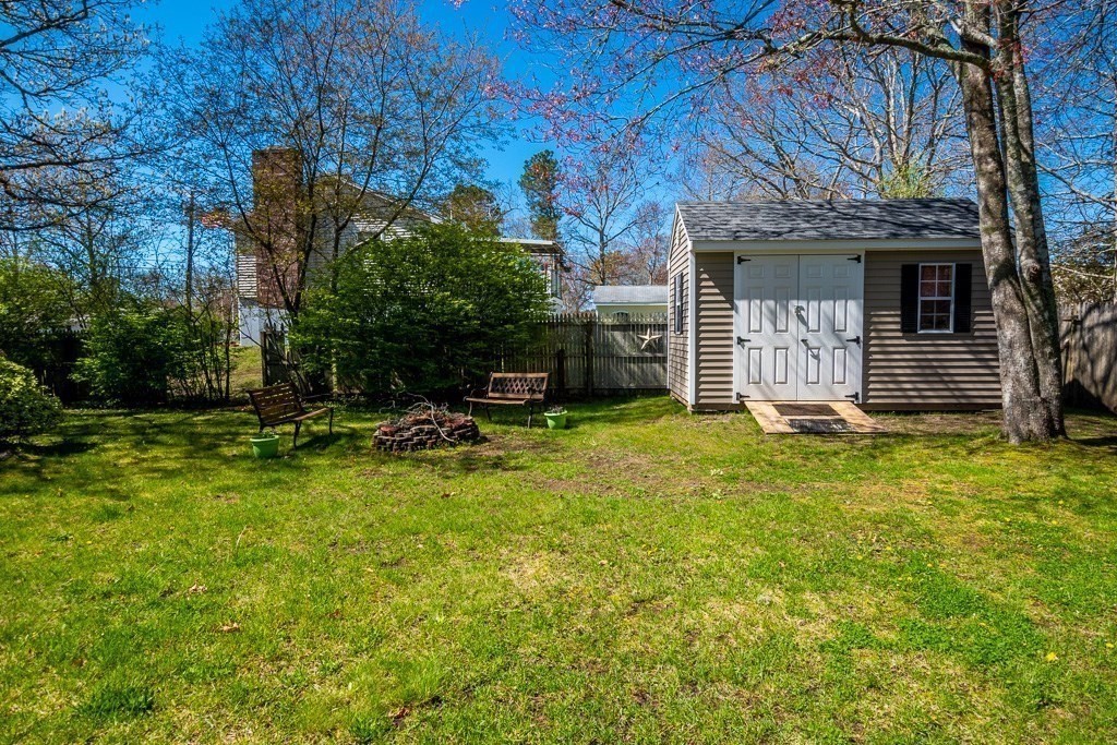 1 Roosevelt Street Wareham, MA 02571 - Photo 14 of 42 a view of a house with backyard and sitting area