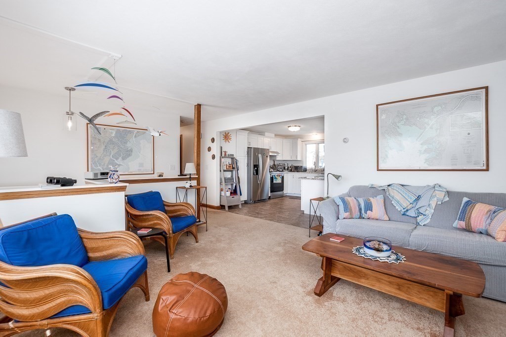 1 Roosevelt Street Wareham, MA 02571 - Photo 25 of 42 a living room with furniture and kitchen view