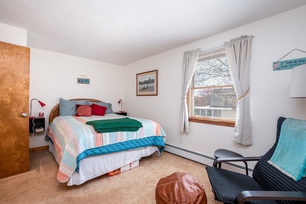 1 Roosevelt Street Wareham, MA 02571 - Photo 27 of 42 a bedroom with a bed chair and window