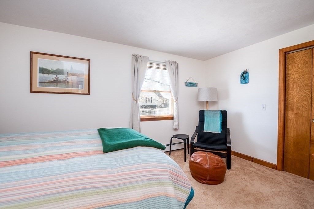 1 Roosevelt Street Wareham, MA 02571 - Photo 28 of 42 a bedroom with bed and a window