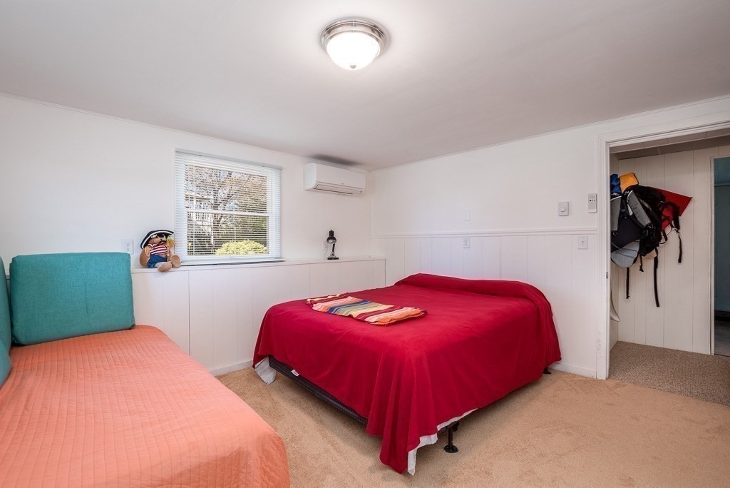 1 Roosevelt Street Wareham, MA 02571 - Photo 37 of 42 a bedroom with a bed and a closet