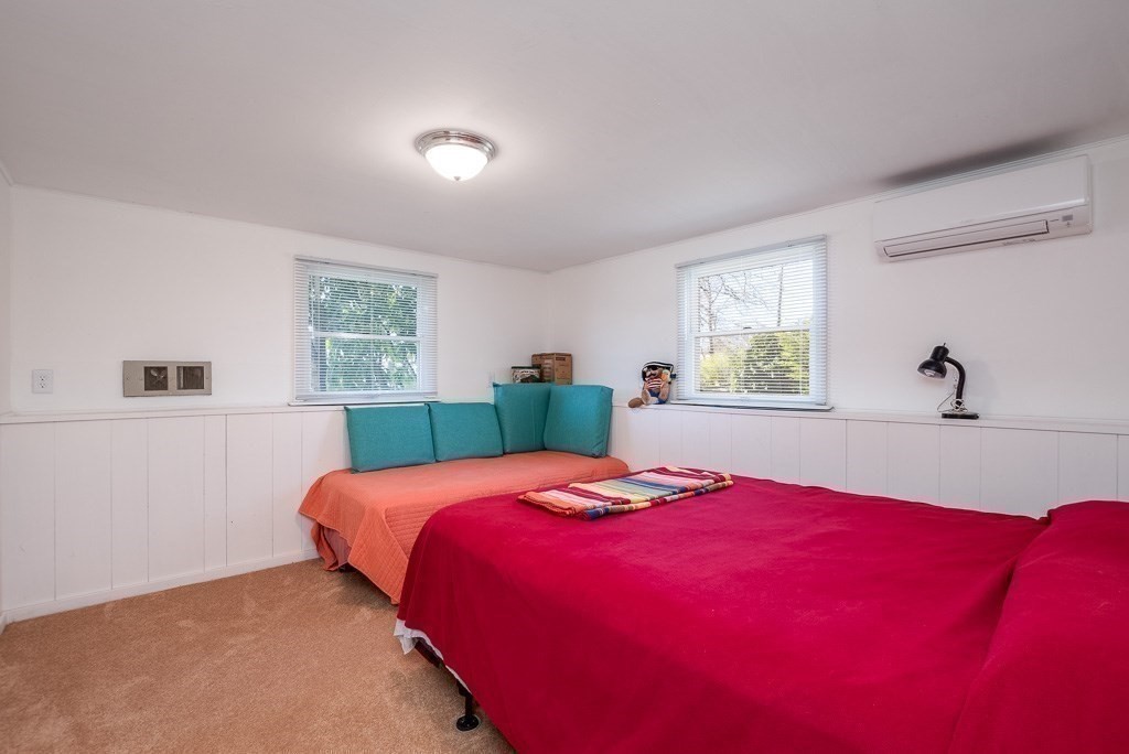 1 Roosevelt Street Wareham, MA 02571 - Photo 38 of 42 a bedroom with a large bed and a window