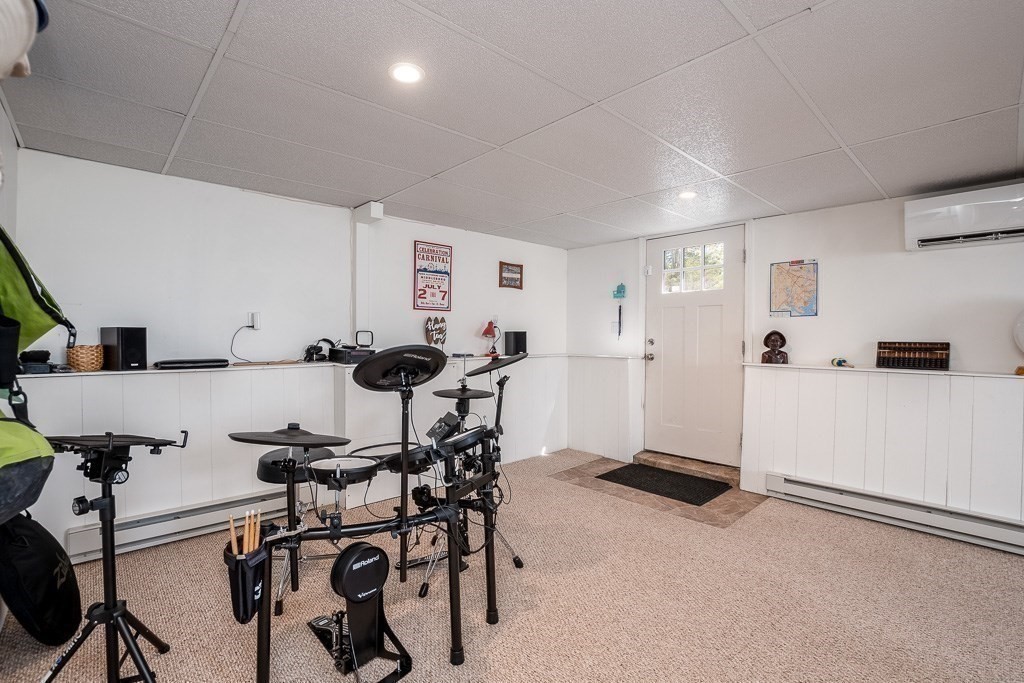 1 Roosevelt Street Wareham, MA 02571 - Photo 39 of 42 a view of a kitchen with workspace and windows