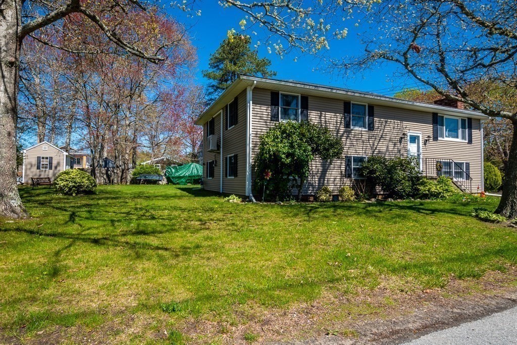 1 Roosevelt Street Wareham, MA 02571 - Photo 8 of 42 a view of a house with backyard and garden