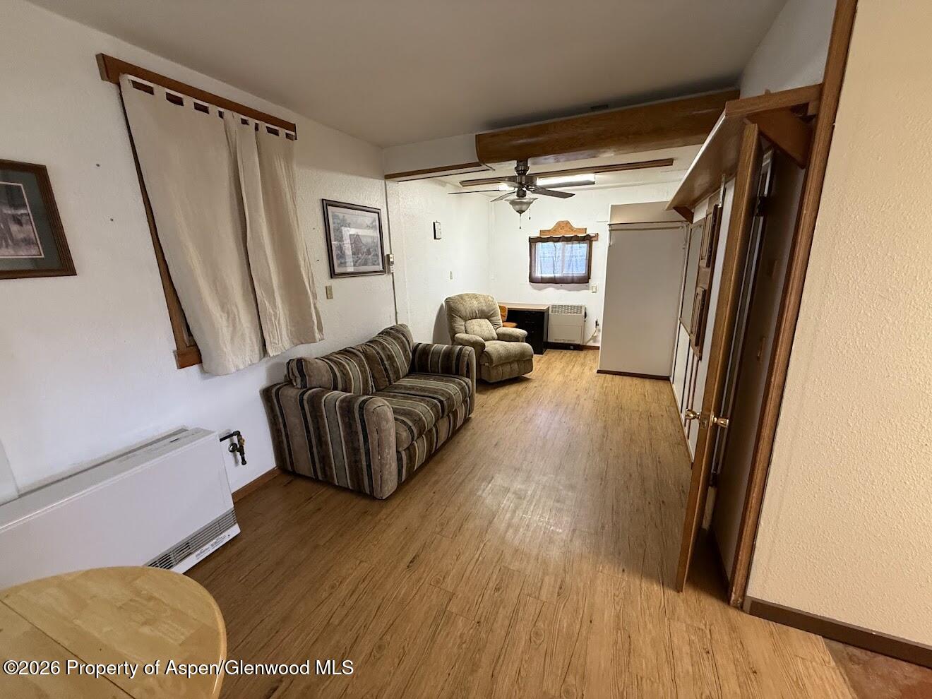 26 Le Blanc Road Craig, CO 81625 - Photo 3 of 9 a living room with furniture and a wooden floor