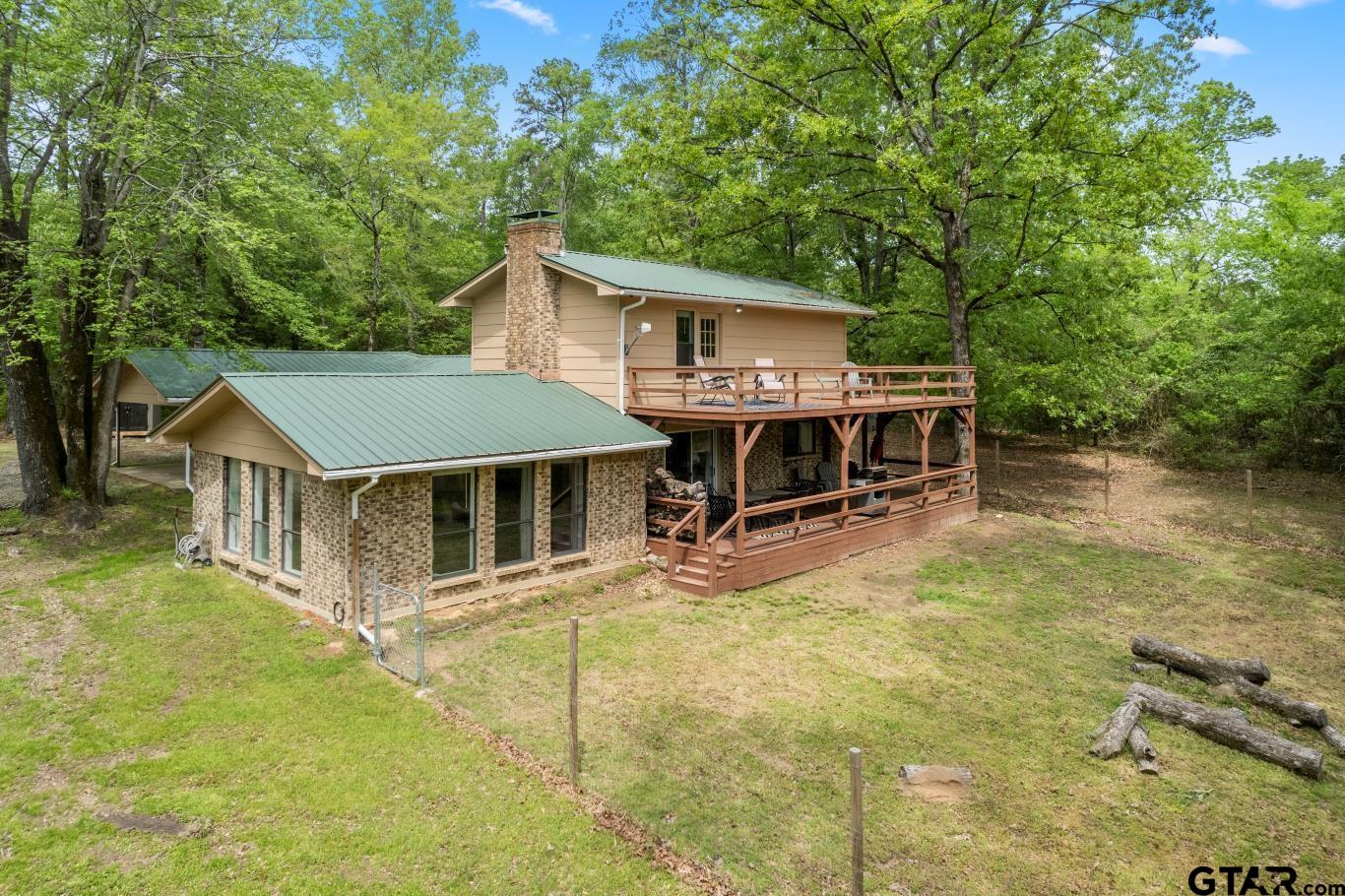 1614 County Road 2600 Mount Pleasant, TX 75455 - Photo 17 of 27 front view of a house with a yard