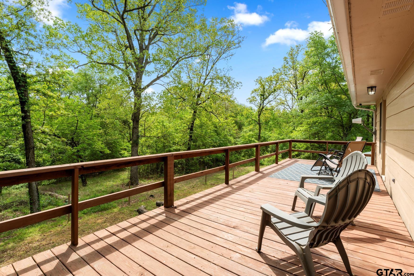 1614 County Road 2600 Mount Pleasant, TX 75455 - Photo 4 of 27 a view of a two chairs in the balcony