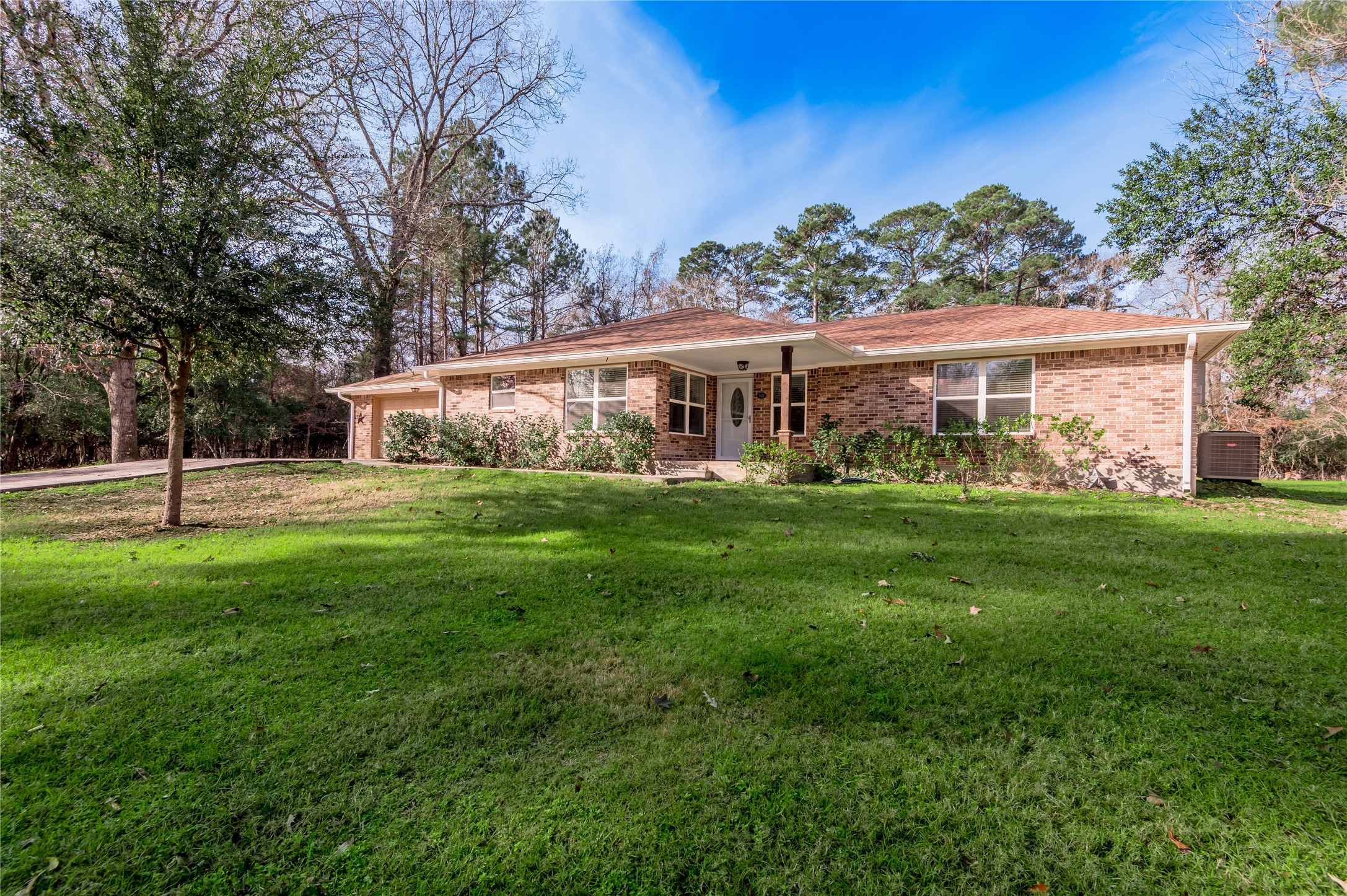 1022 Landing Way Trinity, TX 75862 - Photo 21 of 30 a view of house with yard and green space