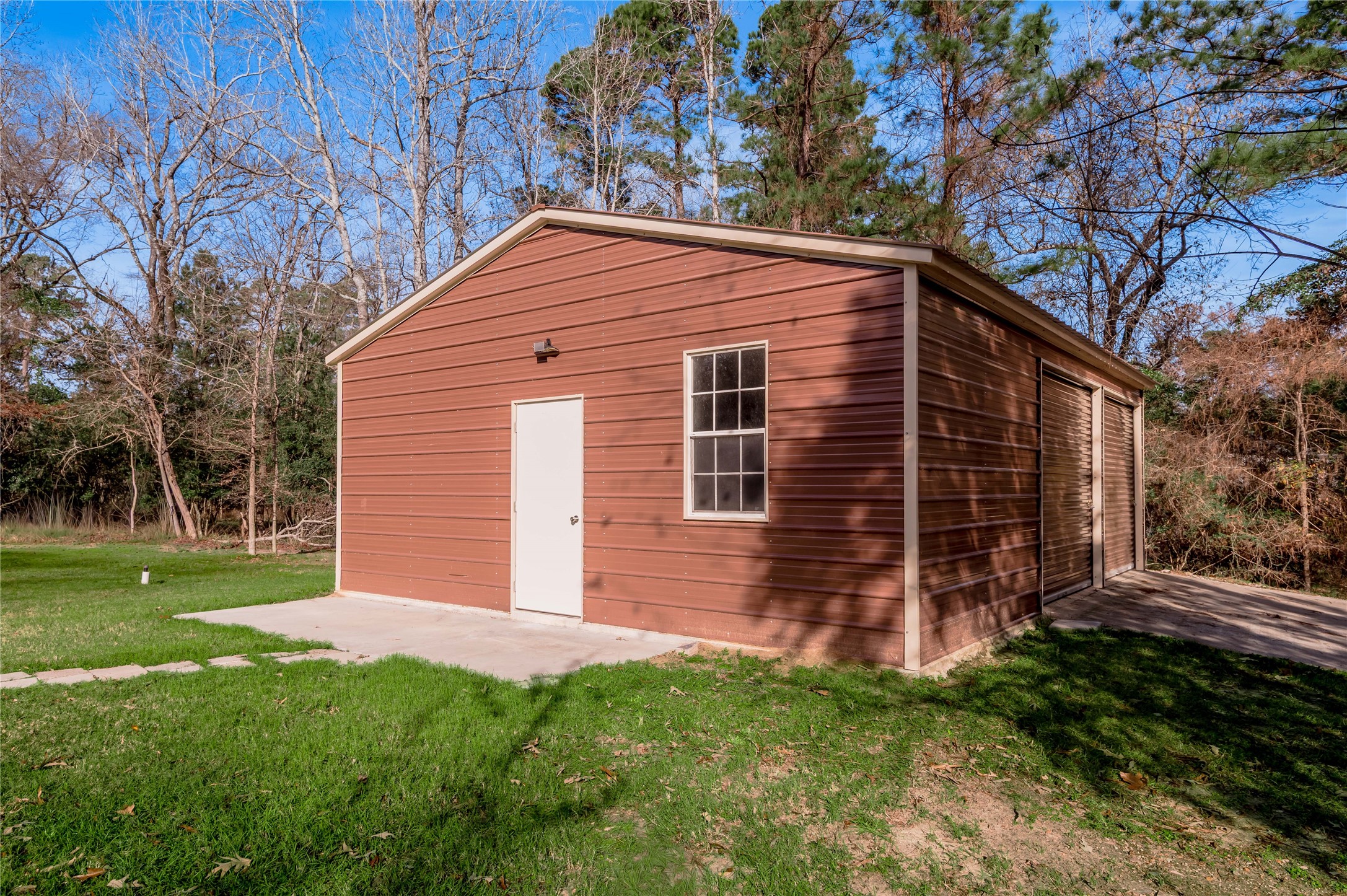 1022 Landing Way Trinity, TX 75862 - Photo 24 of 30 a backyard of a house with lots of green space