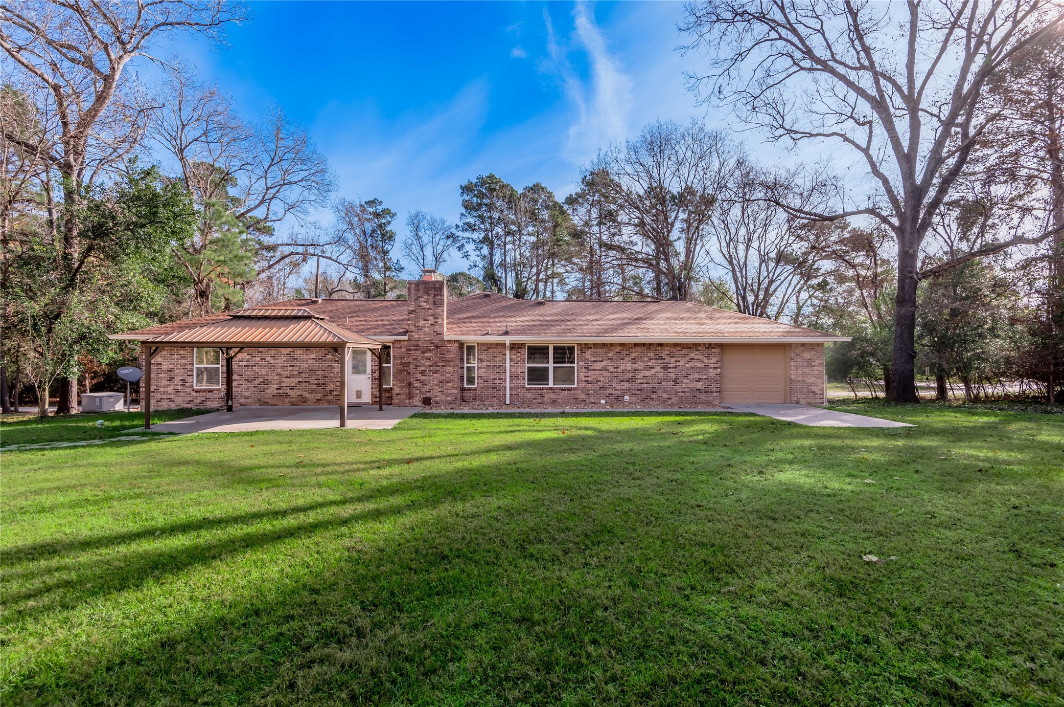 1022 Landing Way Trinity, TX 75862 - Photo 25 of 30 a view of a house with a big yard