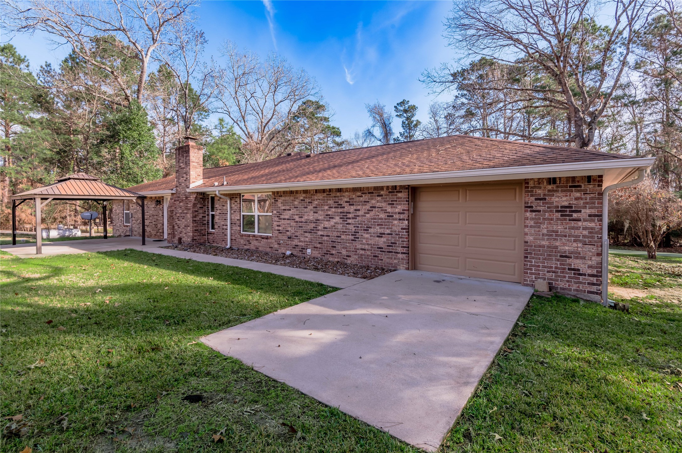 1022 Landing Way Trinity, TX 75862 - Photo 28 of 30 a view of a house with a yard