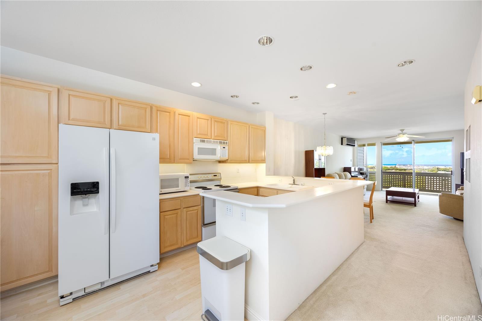 1305E Moanalualani Place, Unit 25C Honolulu, HI 96819 - Photo 3 of 21 a kitchen with a stove a refrigerator and a sink
