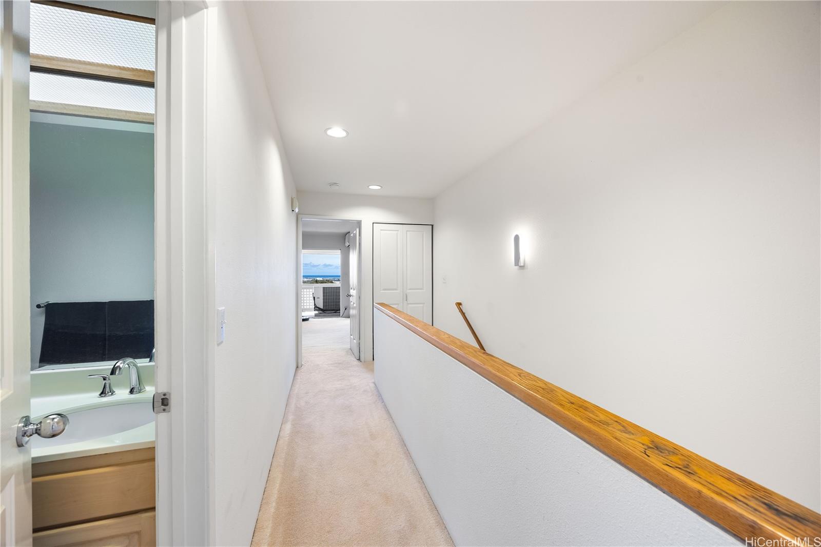 1305E Moanalualani Place, Unit 25C Honolulu, HI 96819 - Photo 9 of 21 a view of a hallway with a living room