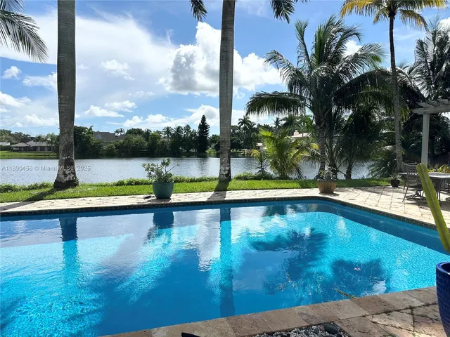 a view of a lake with a yard