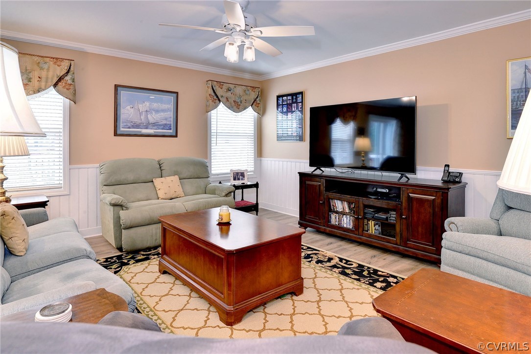 204 Arbordale Loop Williamsburg, VA 23188 - Photo 7 of 41 a living room with furniture and a flat screen tv
