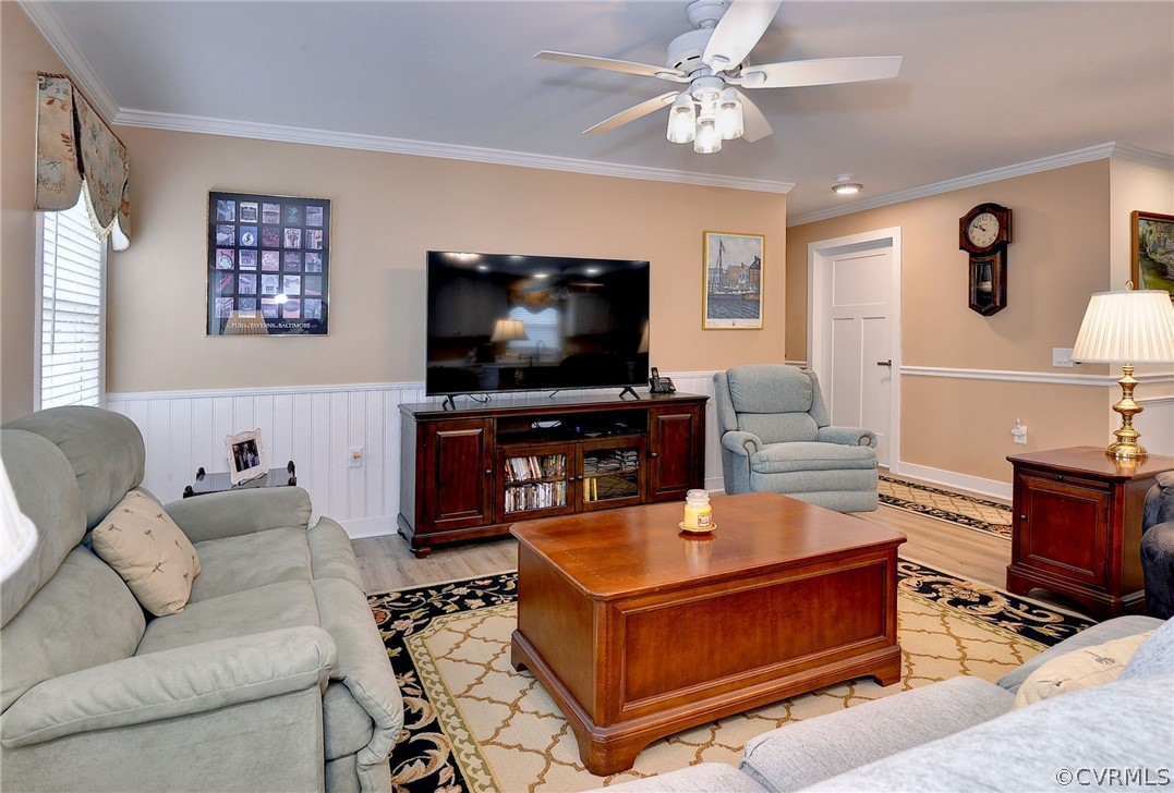 204 Arbordale Loop Williamsburg, VA 23188 - Photo 8 of 41 a living room with furniture and a flat screen tv