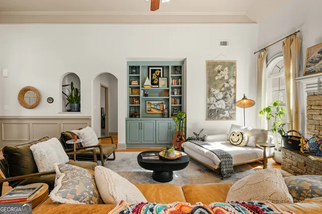 a dining room with furniture and window