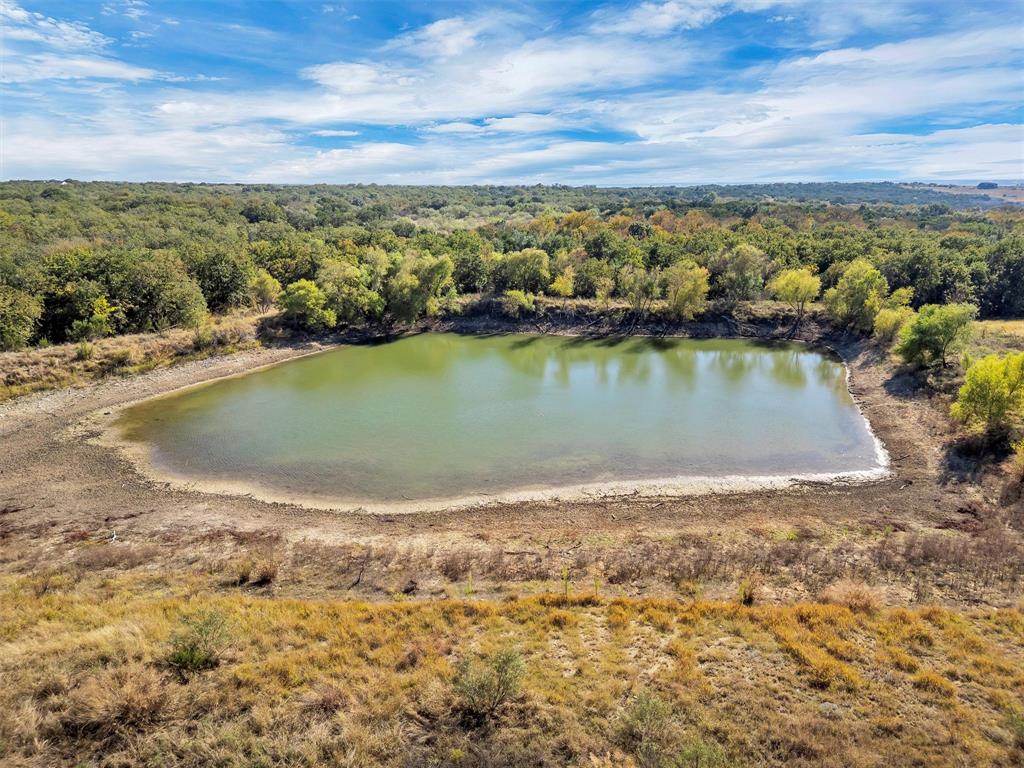 2414 Campbell Road Tolar, TX 76476 - Photo 29 of 31 an aerial view of residential houses with outdoor space