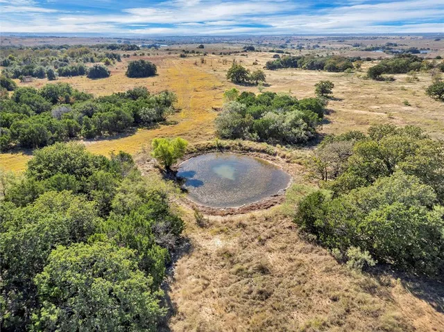 a view of a lake from a yard