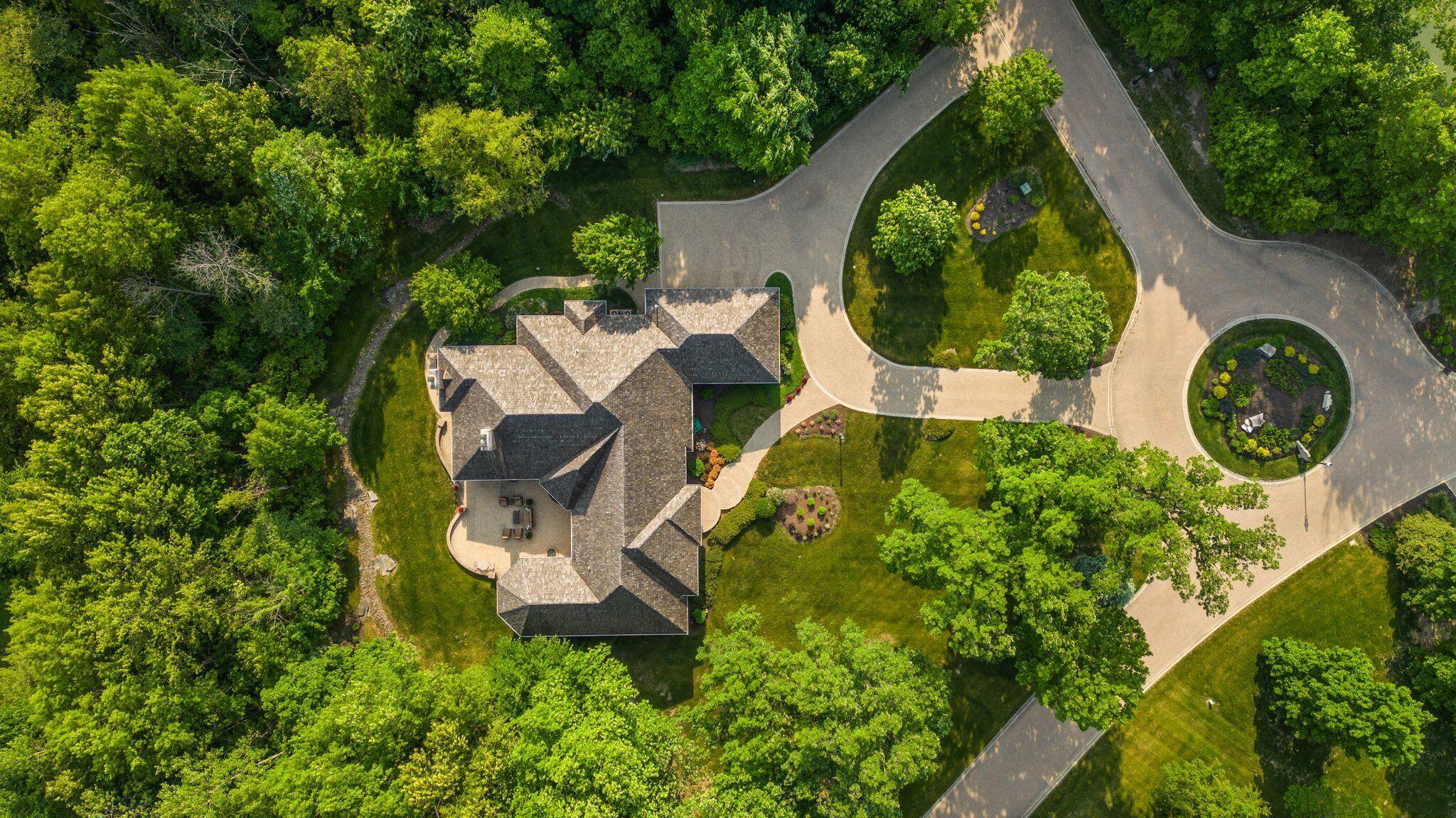 1191 Churchill Lane Crown Point, IN 46307 - Photo 71 of 80 an aerial view of a house with garden space and trees