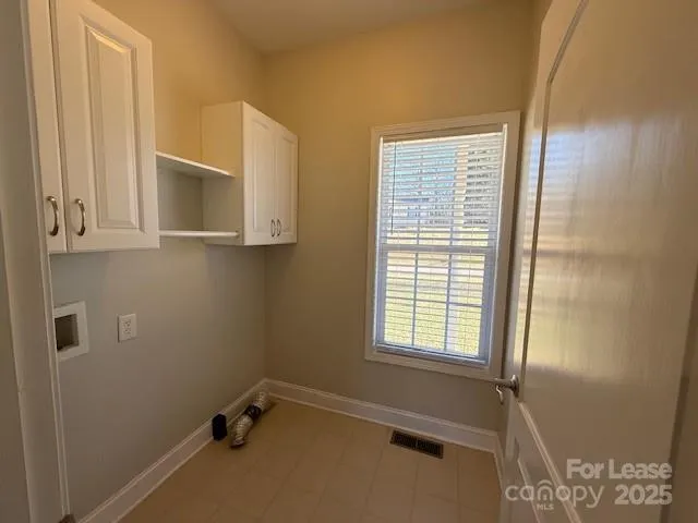 a room with window and gate