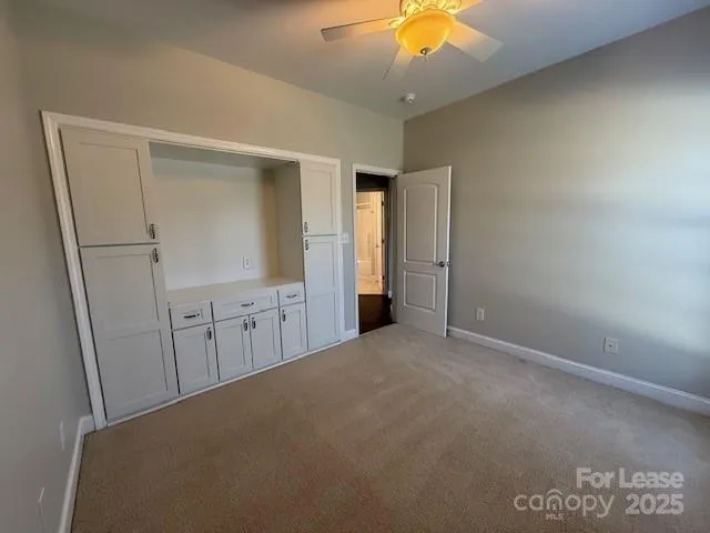 an empty room with a bathroom