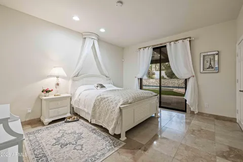 a bed room with a bed and a couch