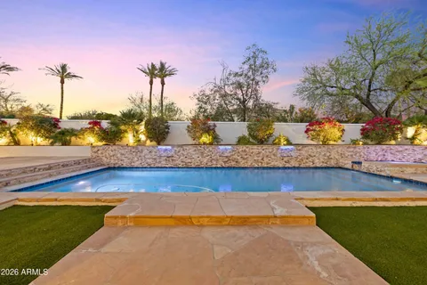 a view of a swimming pool with an outdoor space