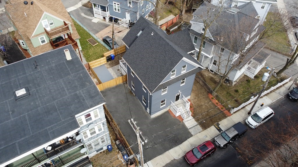 41 School Street, Unit 1 Boston, MA 02124 - Photo 18 of 25 an aerial view of a house with a yard
