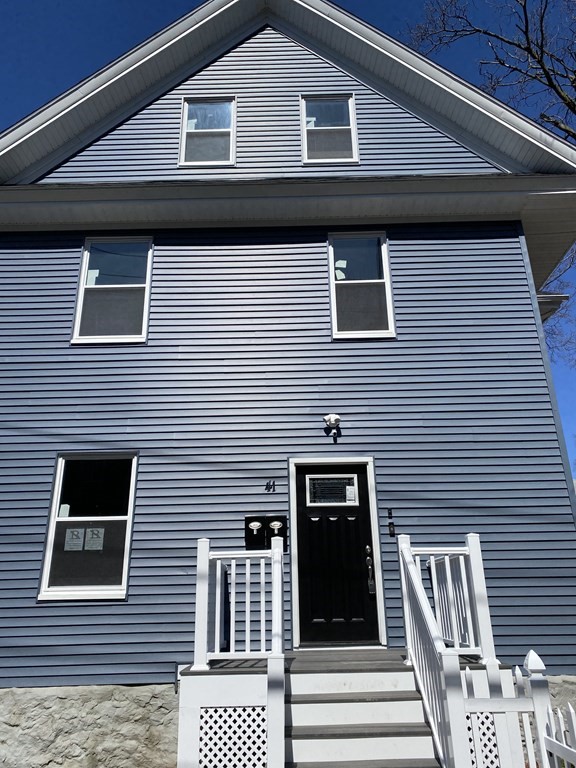 41 School Street, Unit 1 Boston, MA 02124 - Photo 22 of 25 a side view of a house