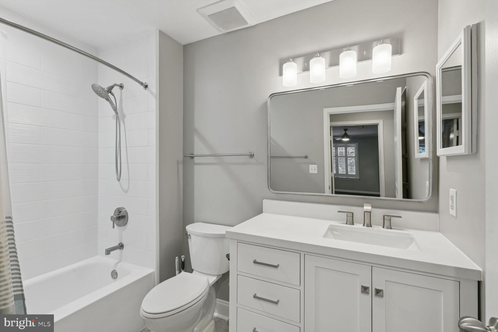 5563 Seminary Road, Unit 216 Falls Church, VA 22041 - Photo 24 of 44 NEW vanity, toilet, lights, & medicine cabinet