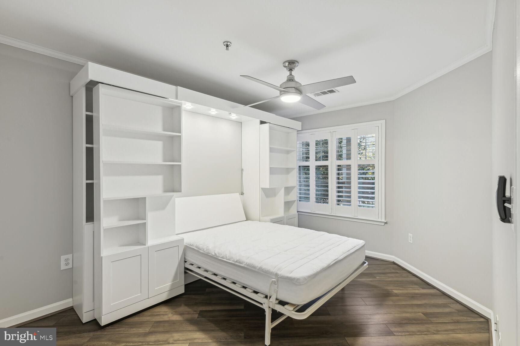 5563 Seminary Road, Unit 216 Falls Church, VA 22041 - Photo 30 of 44 Murphy bed & shelves - versatile use of space
