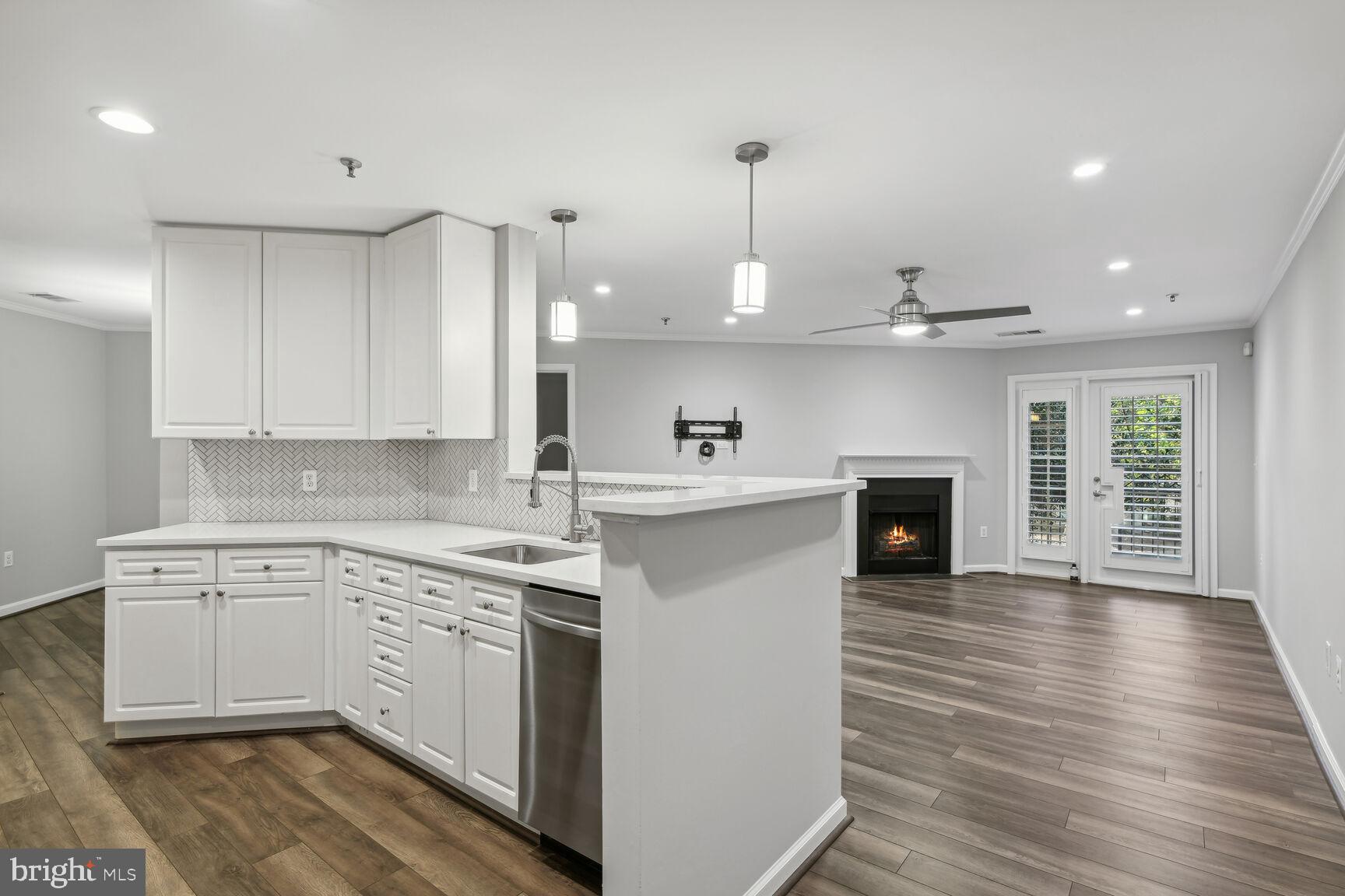 5563 Seminary Road, Unit 216 Falls Church, VA 22041 - Photo 10 of 44 Open Kitchen-Living area & balcony door