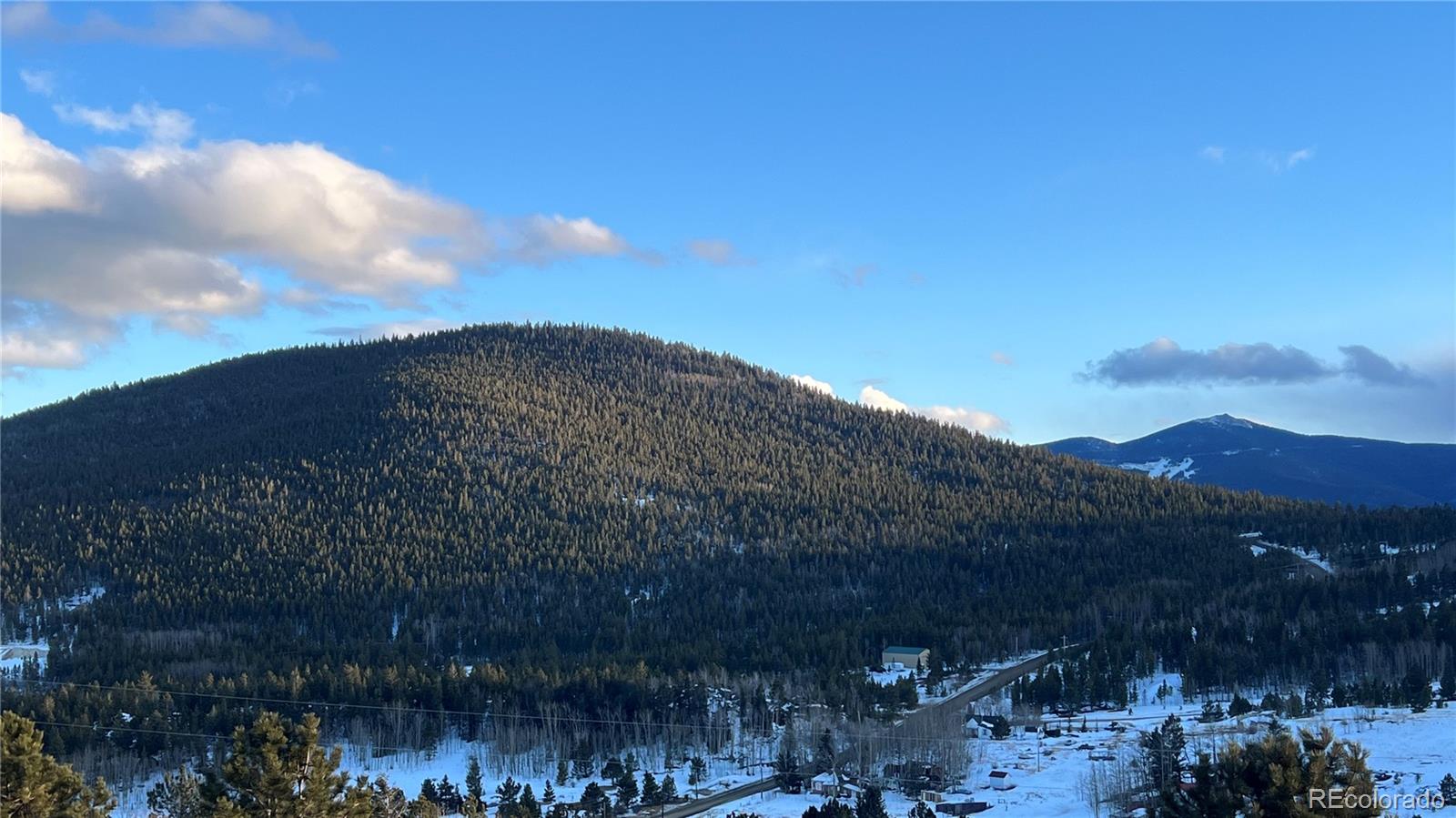 2 Virginia Canyon Road Central City, CO 80427 - Photo 2 of 12 a view of a houses with a yard