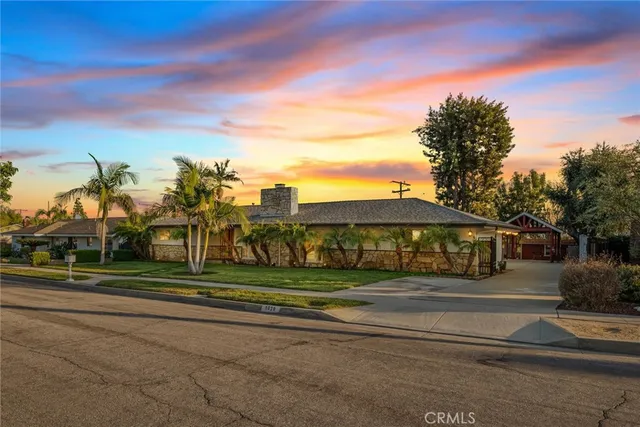 a view of a parked cars in front of a building