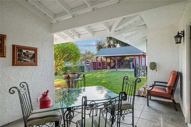 an aerial view of residential houses with city view