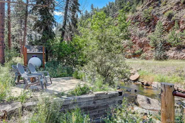 a view of yard with outdoor seating